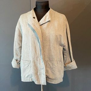OSKA linen jacket with hidden snaps and front pockets.